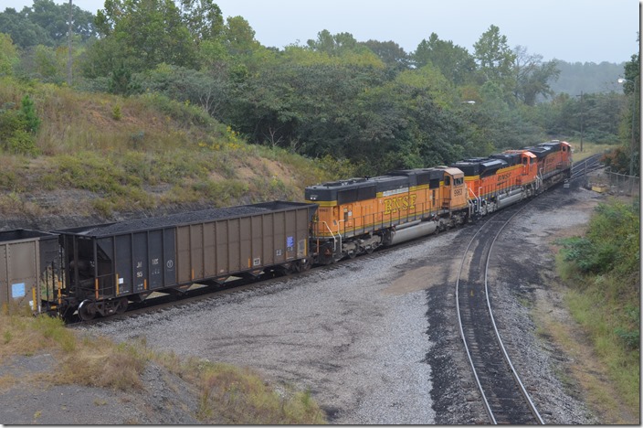 It took a while, but the DPU units – BNSF 9963-8437-5872 – slowly move into view. The switch in the background led around to the L&N when they supplied the plant. AP uses it for car storage now. “JHMX” is a Southern Company reporting mark, but it indicates J. H. Miller. BNSF 9963-8437-5872 ar Miller Plant.
