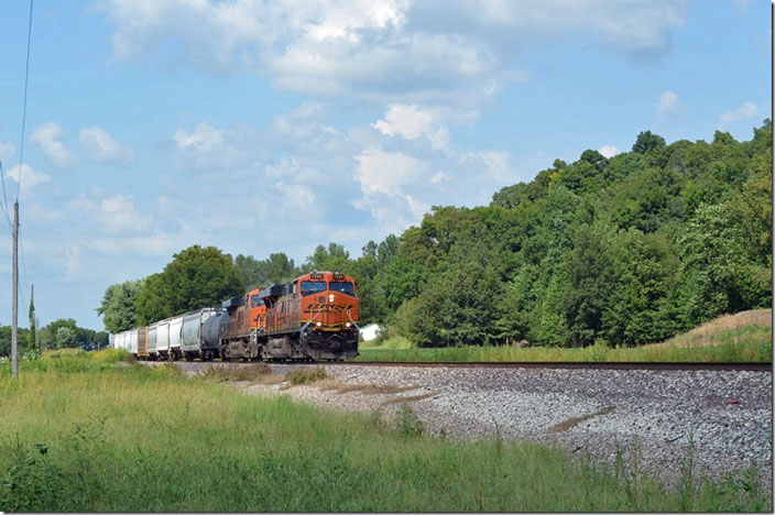 On the move a couple of miles south of Chaffee MO. BNSF 7220-8154.