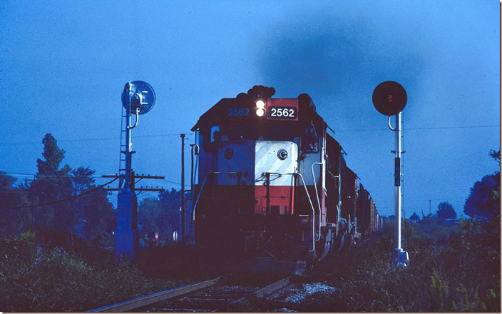 2562 roars out of town toward Memphis. 09-06-1981. Chaffee MO. 2562-6681-6672.