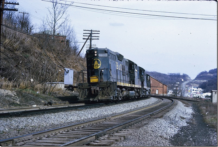 B&O GP9s 6551-6542-6585 w/b at the east end of Clarksburg yard. US 50 is in the background. I can’t remember if they were moving or not. 03-14-1973.