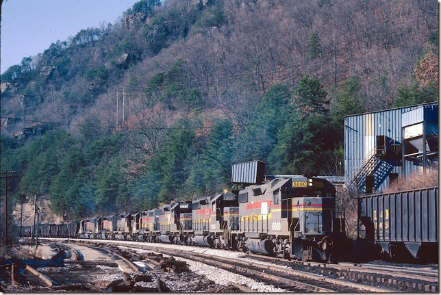 The CSX merger has taken place and Elkhorn Yard has been closed. Crews now originate or terminate at C&O’s Shelby Yard, 15 miles north. Former CRR GP38-2 6000 leads 8033-8237-6274-8285-8132-8084 on a s/b “Shelby Turn” (Dante to Shelby and back). The modernized engine terminal was short-lived. 12-31-1983.