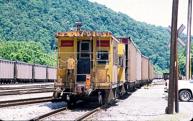 Former C&O cab 904107 brings up the rear of a Myra Shifter arriving Shelby off the SV&E Sub.
