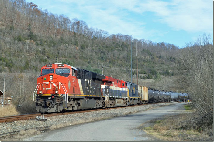 CN 3271-3115-CSX 4561 on w/b K468-24 at Betsy Layne KY with 82 ethanol mtys and 2 buffers. 11-28-2021.