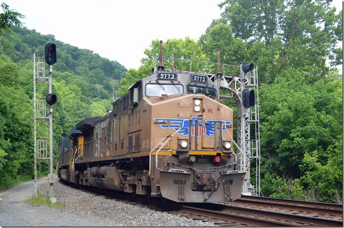 UP 5772-CSX 5291-BNSF 7243 lead an e/b ethanol train onto the #2 track at FO Cabin between Pikeville and Shelby. 06-17-2022.