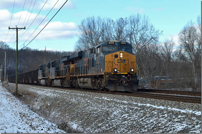 CSX 3172-3293-5107 head e/b U903-19 (Russell to Shelby empties) up Big Sandy at Savage Branch KY, with 230 tubs on 01-21-2022. Marathon Oil’s refinery is around the curve.