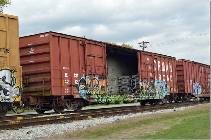 RJCM (R. J. Corman Memphis Line) box 4212 (ex-MP 267766) has a load of aluminum slabs for the Logan Aluminum rolling mill near Lewisburg. RJC also moves a unit train of aluminum slabs from Novelis’ recycling plant at Berea KY, to Russellville and Logan. Logan Aluminum is partly owned by Novelis, the world’s largest recycler of aluminum. Russellville KY.