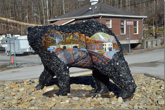 Black bears on Black Mountain are numerous. The Harlan County High School nickname is the Black Bears. This one is crafted out of coal. Portal 31 is in the background. USS Lynch.