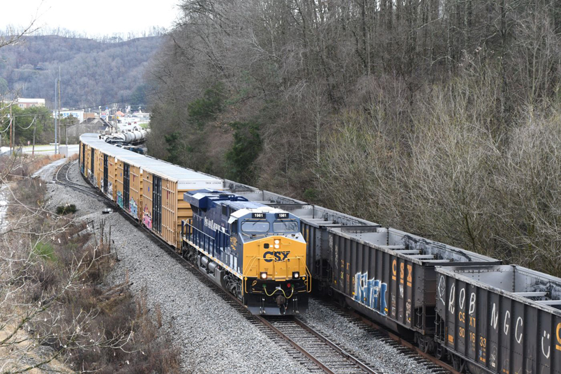 L200-29 approaches Coal Run Jct. on the passing siding. A 200-car train of McClure empties waits on the main line.