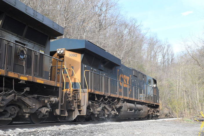 CSX 3092 is sanding the rail as it pulls R211-28 down the steep grade from the Feats mine at Holden. 03-28-2025.
