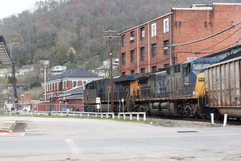 The brick former C&O depot is in the background. It is now the city hall. The Island Creek SD joins the Logan SD just past the depot at FD Cabin.