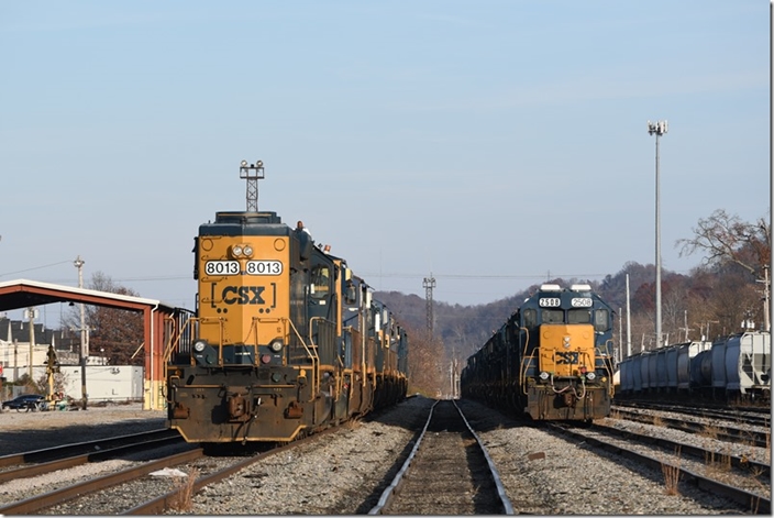 CSX SD40-2 8013 and GP38-2 2508 stored in Huntington yard on 11-25-2023.