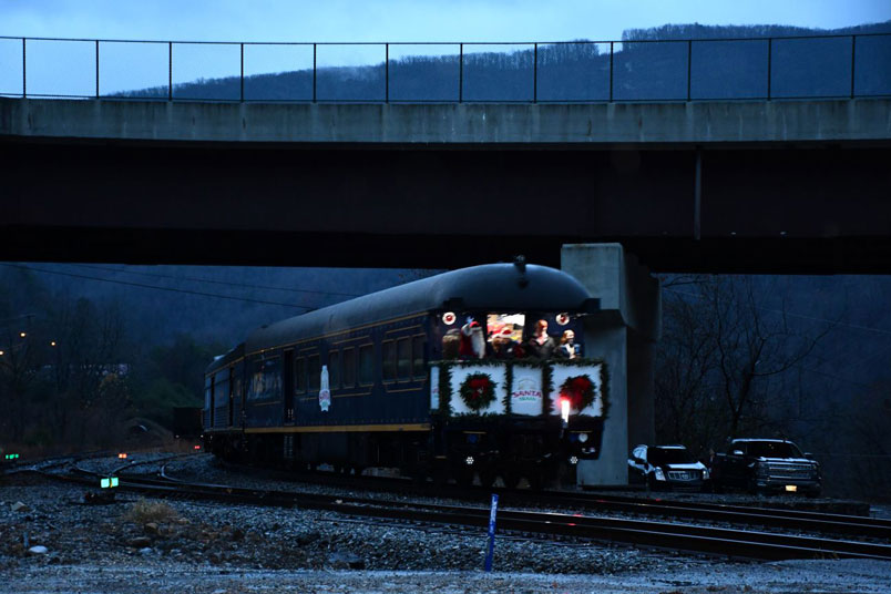 A bunch of bystanders and railfans were on hand to watch P001-22 pick up speed.
