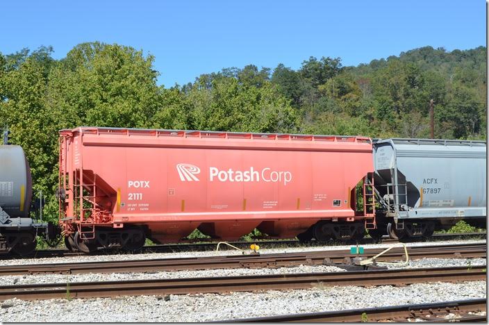 POTX (PCS Sales USA or Potash Corp.) covered hopper 2111 leaving Shelby KY on 09-24-2017.