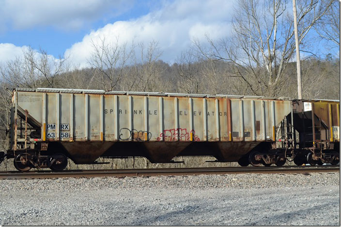 PMRX (Progress Rail Leasing) covered hopper 6358 is ex-INTX, nee-CRDX. 202,400, 4760 cu. feet volume. I like covered hoppers with the elevator location. Q693 at Shelby KY on 02-05-2021.