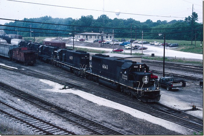 MEMH (Memphis to Markham Yard) adds three ex-Southern GP38s to its train. These were brought down from Paducah where presumably they received work at VMV. IC Fulton KY.