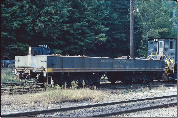 The grade was very steep at Lynch, so this brake sled was needed to assist the S-2 in switching. It was converted from a coal tender. “PM” was embossed on the trucks. Lynch. 10-08-1978.