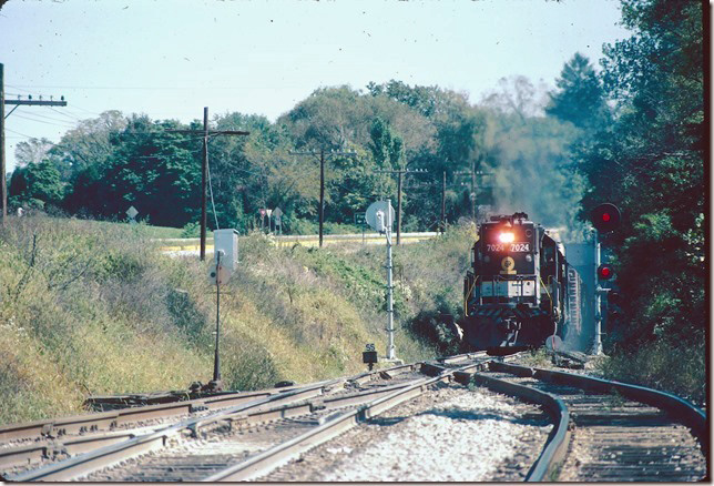 Southern 7024 coming out of tunnel with w/b freight on 09-23-1981.