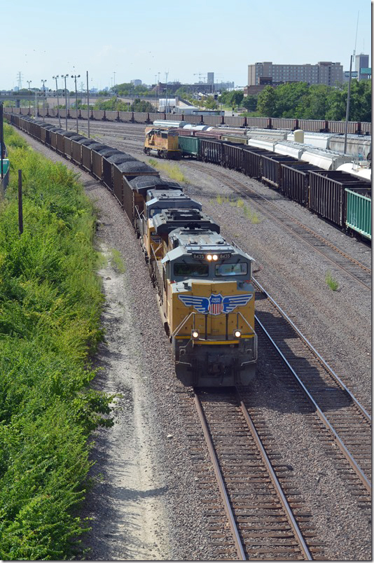 Lastly an e/b UP coal train rolls by behind UP 8435-6550. These were all UP and CTRN aluminum cars. St Louis MO.