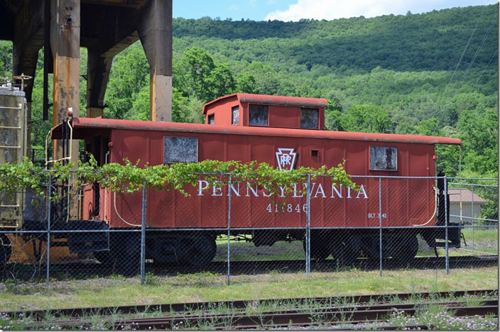 Looks line a New Haven class NE-5 steel caboose. It probably got on the property when Penn Central was forced to include the NH. I don’t know if this faux PRR cab ever had the number 411846 under Penn Central or Conrail. Renovo PA.