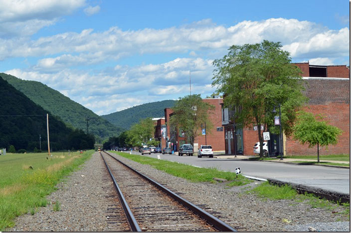 The entire yard has been removed on the left. The depot would have been on my right. Sue was happily visiting the new Goodwill Store also on my right. NS 8175-9943. Renovo PA.