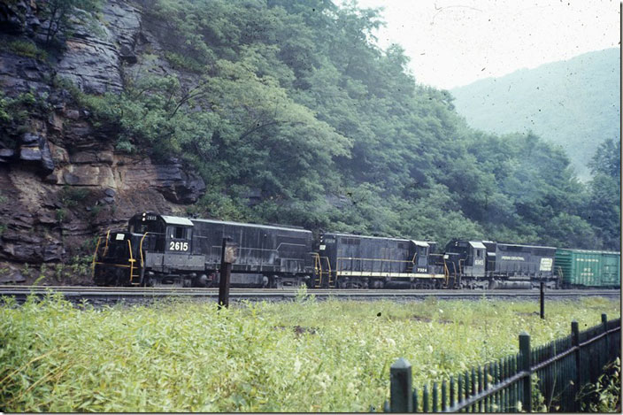 My first visit to the Horseshoe Curve was on a misty 08-09-1970 with my parents. Penn Central 2615-7324-6145 handle a w/b freight. Horseshoe Curve.