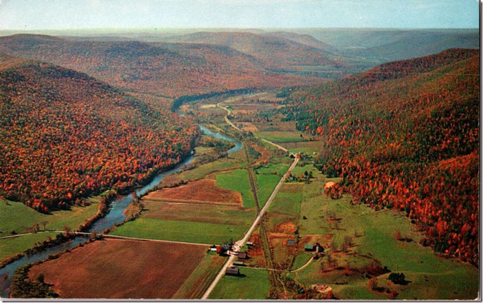 B&O Ansonia Subdivision looking west from Ansonia (wide spot in the road) toward Gaines Jct. and Galeton. That’s US 6. Colton Road goes to the left beside the brown field. Not much has changed except the railroad is gone. B&O scene Pine Creek Ansonia US 6.