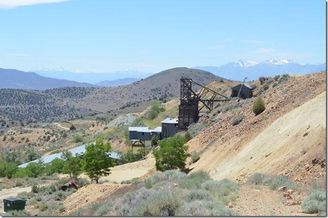 The Crown Point Mine looking southwest. High mountains bordering Lake Tahoe in distance. 