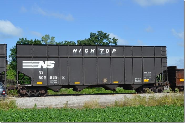 NS “High Top” was converted from a standard hopper built 07-1978. It now has a volume of 5,465 cubic feet. NS class H63AR. Stored near Marion OH on 06-21-2015. This car is an ex-Con…CR 488445, to be precise. NS hopper 802639 Harvey OH.
