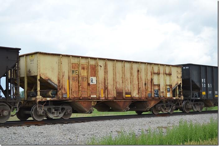 WE 43117R is a former ICRX (Island Creek Coal) hopper that was built in N&W’s Roanoke Car Shop, I think. It is restricted to home rails. Carey OH 06-18-2015. Its immediate previous identity was CMCX 43117 (Sweetman Construction Company). They may have been CMCX cars since 1991. These are significantly smaller than the ICRX cars, which went to AEX.