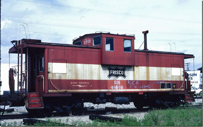 We stumbled across this ex-Frisco caboose in Ash Grove MO on 08-08-1986. BN cab 11616. It had been retired and donated. Looks like an International Car product. Chaffee MO.