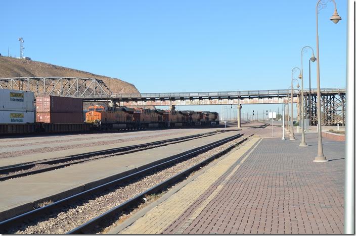 BNSF 6329-7257-8031-3925-3969 are pulling to a stop with a w/b intermodal train. Barstow CA.