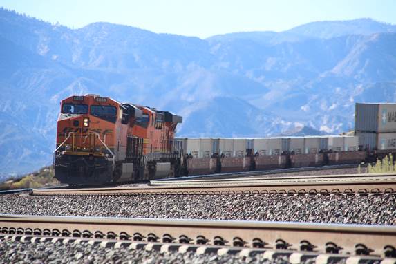 BN-SF 6859, a GE ES44C4, and BN-SF 7697, a GE ES44DC, are providing dynamic braking as their train descends down the west slope of Cajon Pass.