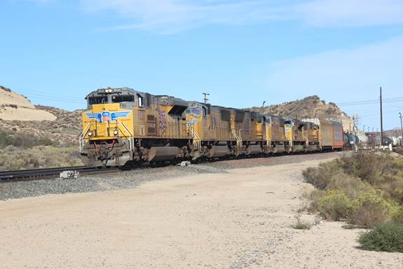 This Union Pacific mixed freight is running westbound on BN-SF’s Track #3.