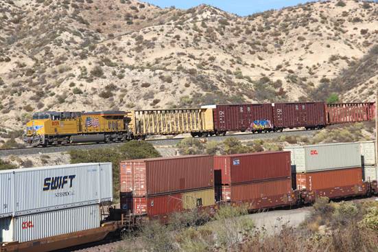 UP 8159, an EM SD70ACE, in pusher service, is at CP SP468 heading up the west slope of Cajon Pass.