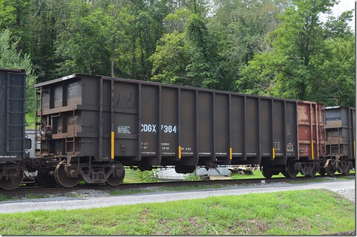 COGX (Rail Connection Inc.) gon 7364, ex-PSCX 364, 203,900, 4000 cu ft, blt 10-1975. In scrap tie service on Appalachian & Ohio RR at Burnsville WV. 07-27-2016.