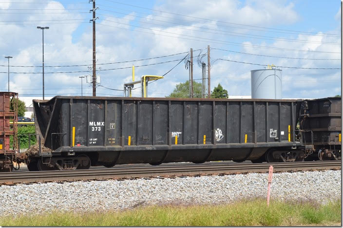 Metal Management Inc (MLMX) gon 373 is passing through NS’s Montview yard at Lynchburg VA on 08-25-2018. Looks like an old “Coalveyor” design.