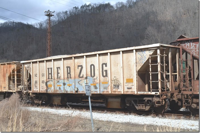 Herzog Contracting (HZGX) hopper 6649 on ballast train at Shelby KY on 03-17-2018. 203,750 load limit, 2200 cu ft volume, blt 05-1977.