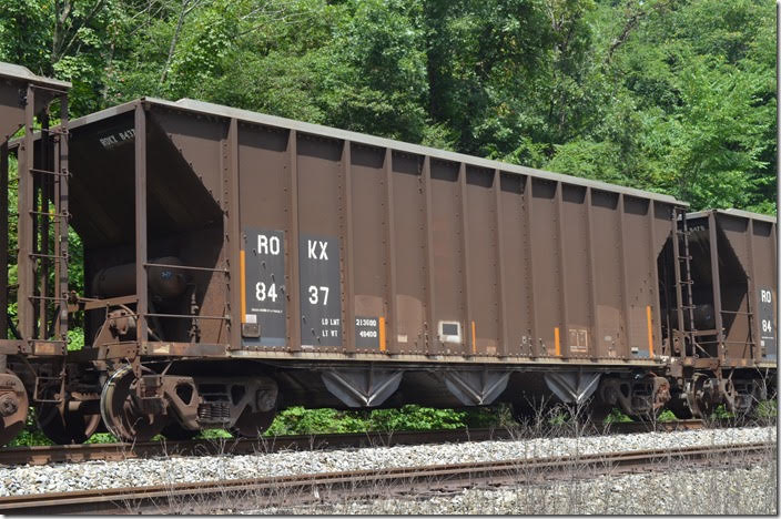ROKX hopper 8437 is also 213,100 load limit, 3283 cu ft and built 11-1984. This southbound unit stone train is parked on the former VGN at Kellysville WV. It was loaded by Boxley in Princeton yard and is going to the Hyco NC power plant for use in scrubbers.