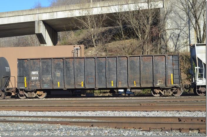 FMTX (Freedom Metals Inc) gon 8311 is ex-JTIX 100108, nee-CEPX 1485. It is passing through Williamson WV on 01-05-2019 on an eastbound NS freight. Freedom Metals is headquartered in Louisville and has several metal recycling locations in central Kentucky. Williamson WV.