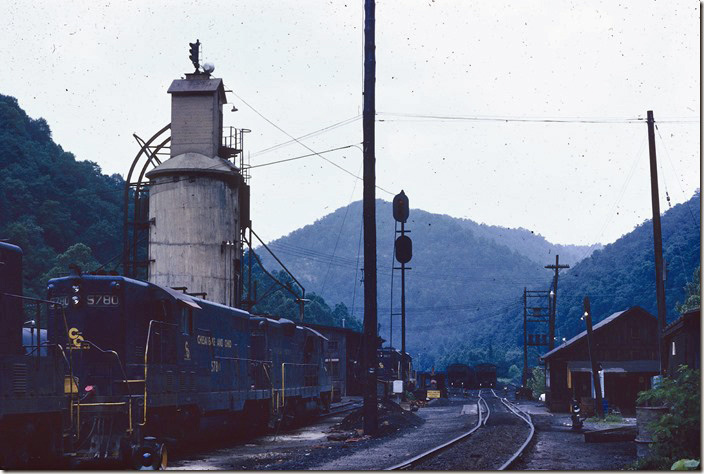 The signal on top of the coal tower and high mast signal were used to instruct the yard crew during weighing operations. 5780, 6258 and 5875 are in view. 06-20-1971. Big Coal, Cabin Creek SD.