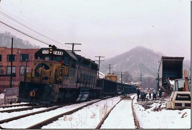 The saddest train of all. C&O 7426 on work train removing track in Pikeville. 02-1980. Big Sandy SD.