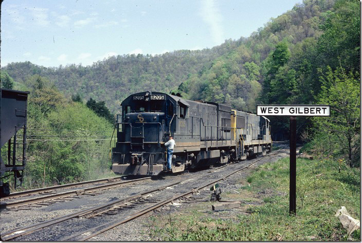 The “N&W Shifter” pauses at West Gilbert to pull loads from the tipple. C&O Logan, Buffalo, IC SD.