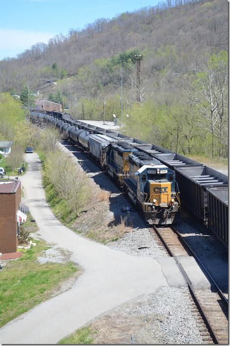 CSX 8388-8853. View .2 Shelby. K446-07 departs on the main as an empty train arrives up the yard lead. 