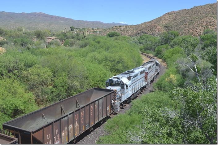 The local will soon be stopping at Ray Jct. to allow the westbound OT-1 to get on the branch up to the mine. CBRY 302-501. Kelvin AZ.