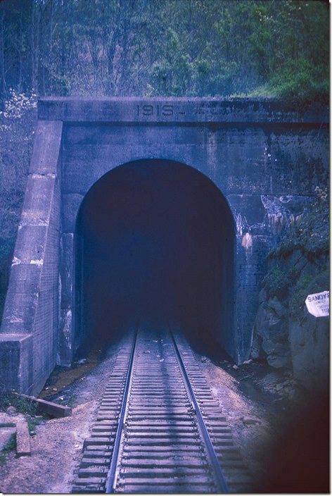 North portal of Sandy Ridge Tunnel. Top of the grade between the Big Sandy and the Clinch River. At 7,854 feet the longest on the Clinchfield. 04-27-1974.