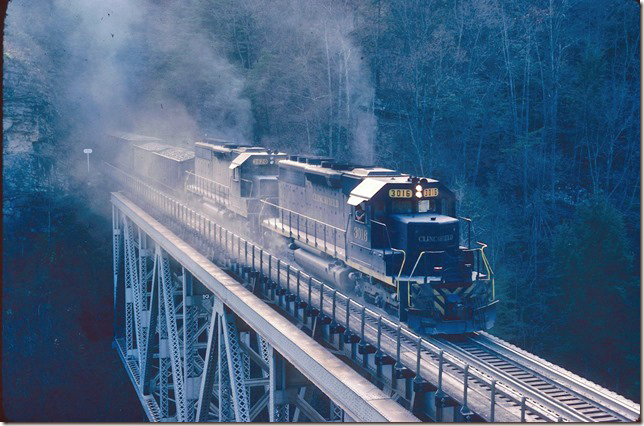 CRR 3016-3620 grind up grade with a s/b coal train. 11-09-1977. Pool Point.