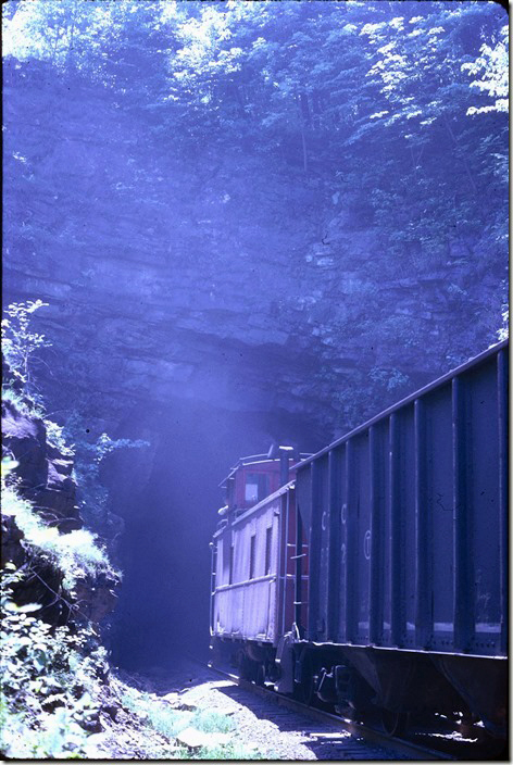 CRR Cab 1065 exits State Line Tunnel on the rear of n/b #95 on 05-31-1971. C&O empties always filled out the train. Pool Point.