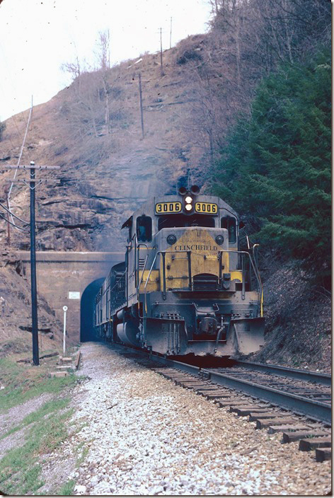 CRR 3006-200-800-2005 exits Perkins Tunnel with #26. 04-02-1978.