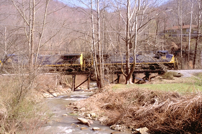 Crossing the creek on a small trestle at Stanfill, Ky.