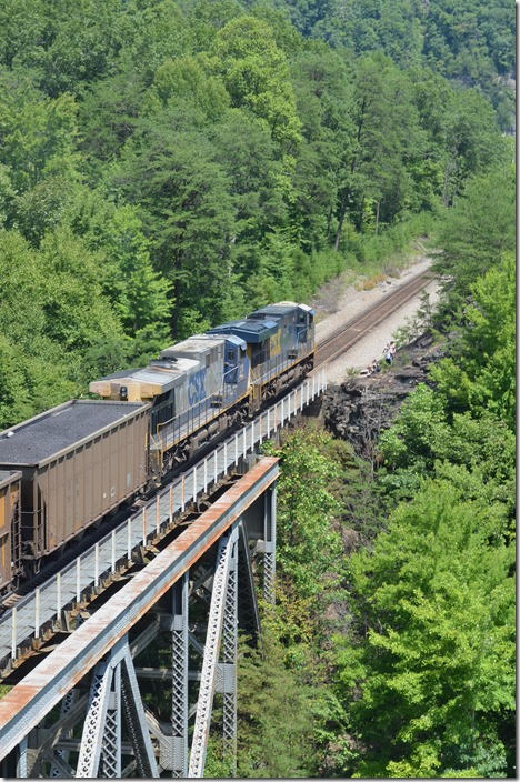 N312-03 grinds slowly up the steep grade across Pool Point trestle just south of Elkhorn City KY, on the Kingsport SD (former CRR). CSX 844-211.